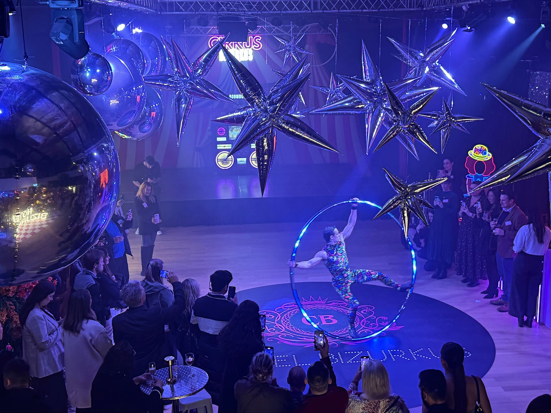 Aerial hoop performer entertaining guests at 3Danks Waterloo